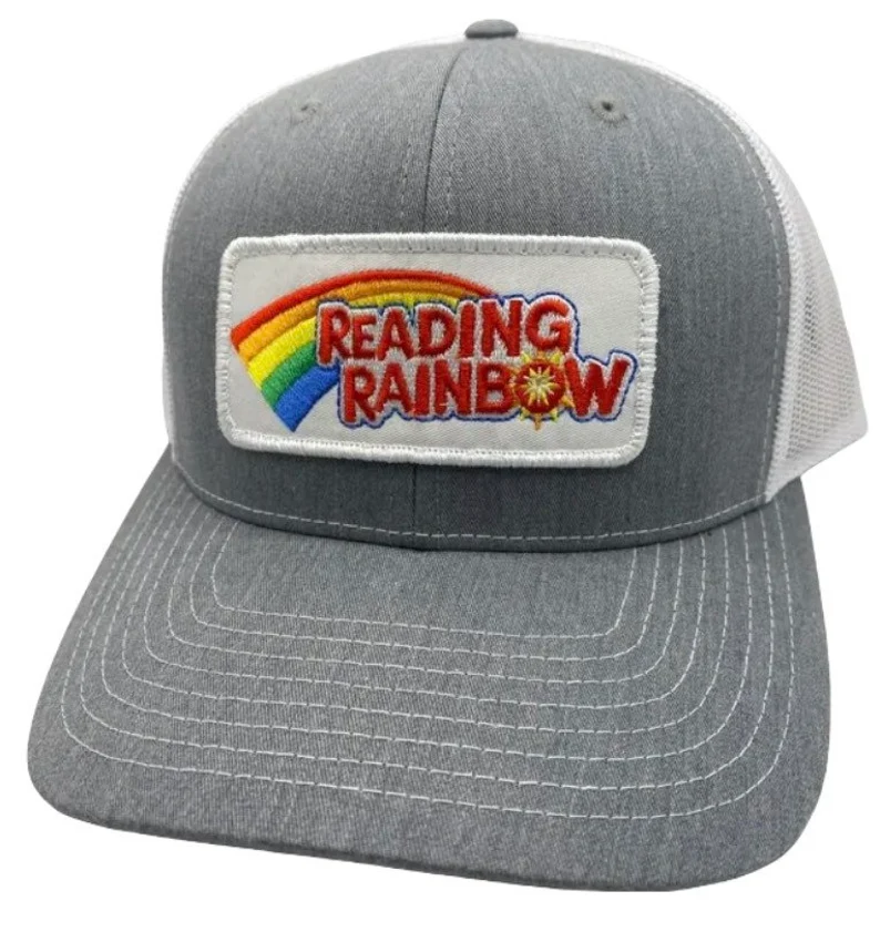 image of a gray trucker hat. It has a reading rainbow patch on the front. 