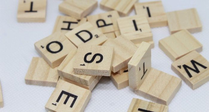 a photo of a pile of scrabble tiles