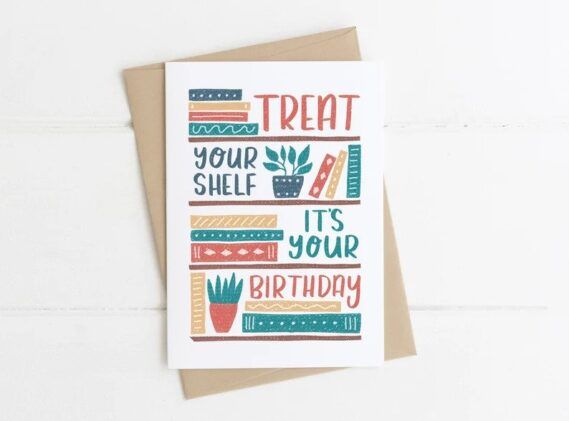 Birthday card with a bookcase. "Treat your shelf it's your birthday" is spelled out.