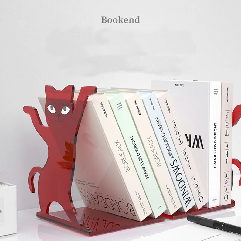 Image of a red acrylic cat bookend holding up a stack of white books. 