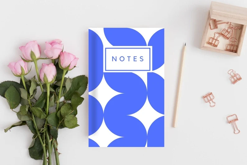 Image of a blue and white notebook.