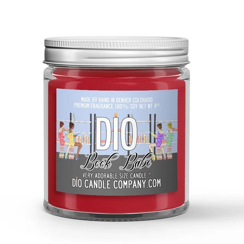 Image of a red candle with a label reading "Dio Book Babe."