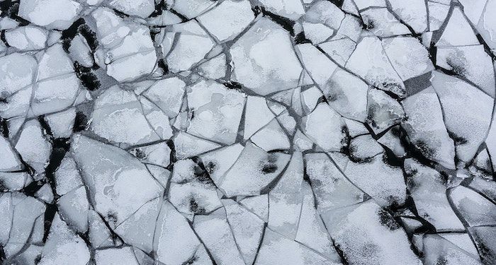 a photo of a pattern of cracked ice