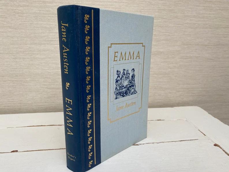 photo of a vintage copy of Emma, with blue cover and gold lettering