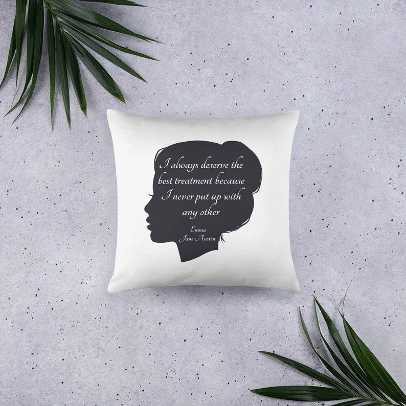 Photo of a pillow case with the silhouette of a woman with a quote from Emma printed on top