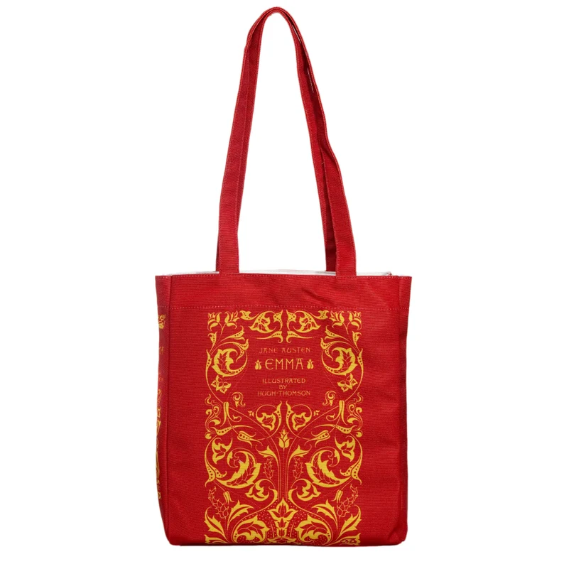 photo of a red totebag with an imprint of an Emma book cover