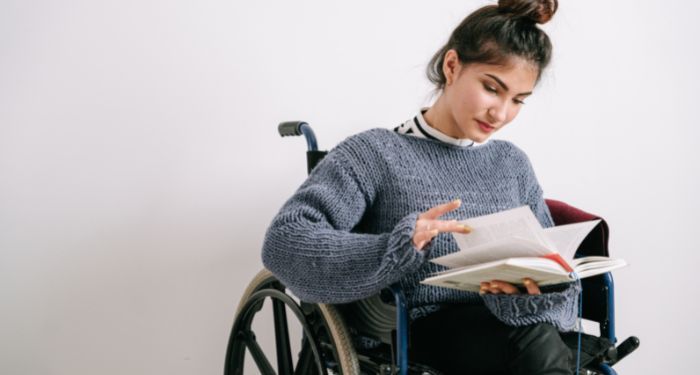 Person reading in a wheelchair