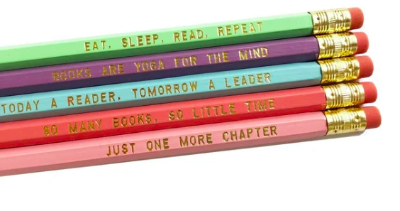 Five pastel colored pencils with embossed sayings like "Today a reader, tomorrow a leader" and  "just one more chapter"