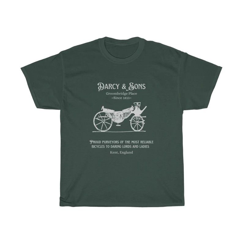 Photo of a black T-shirt showcasing the logo of Darcy & Sons business in white print. 