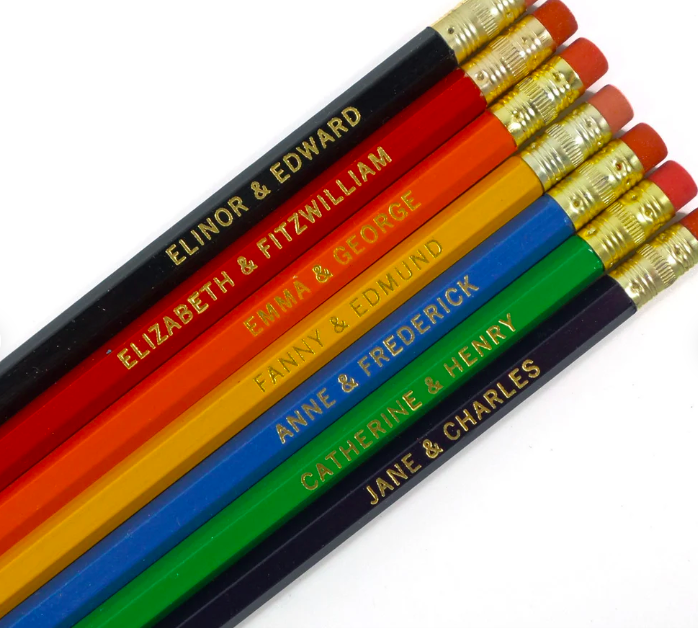 Colorful pencils with the first names of various couples from Jane Austen novels embossed in gold