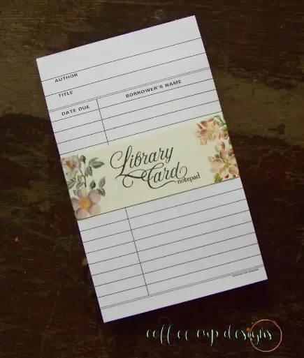 Notepad with sheets that look like library cards with lines for due dates, borrower, etc.