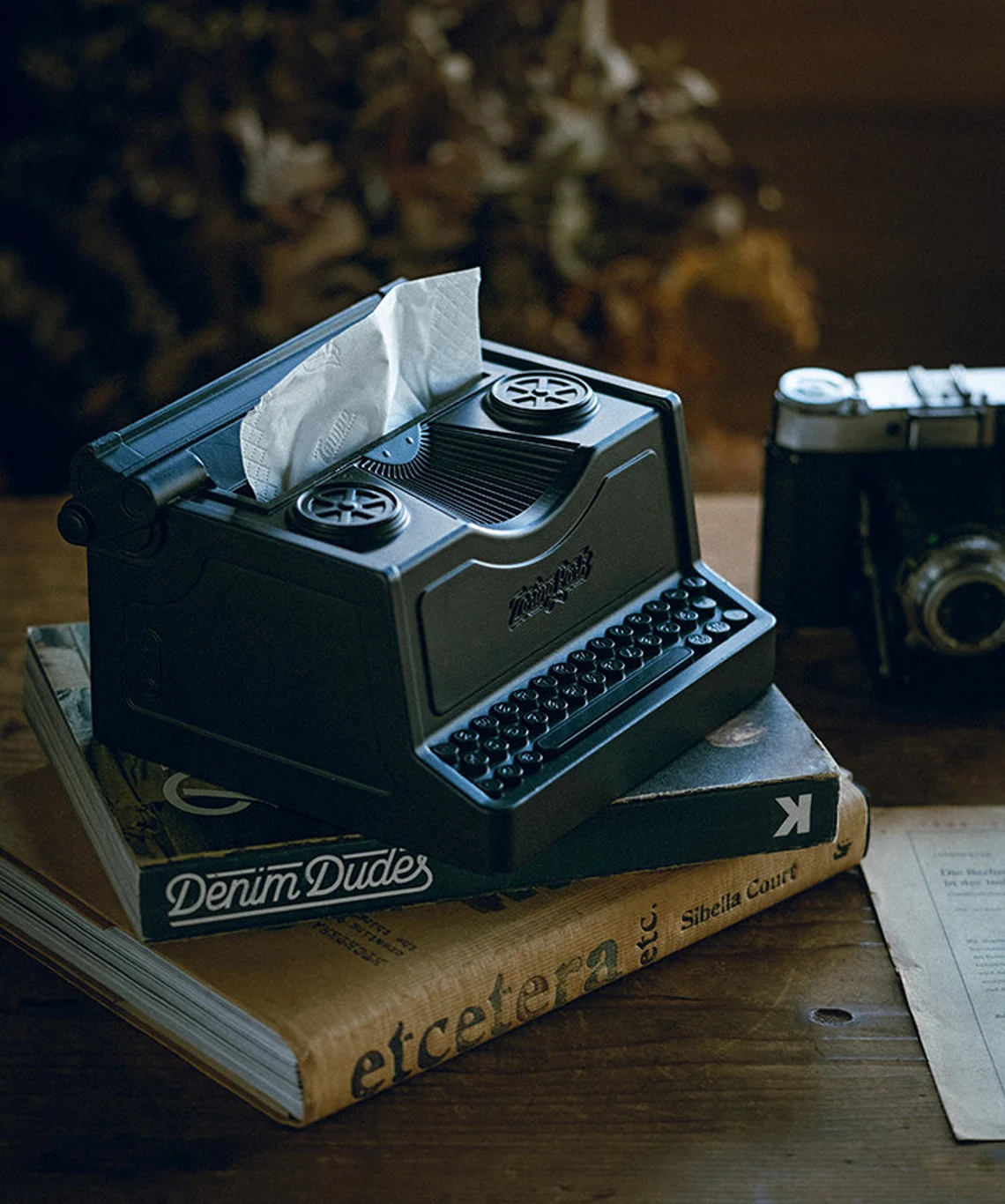 Tissue box holder shaped like a typewriter