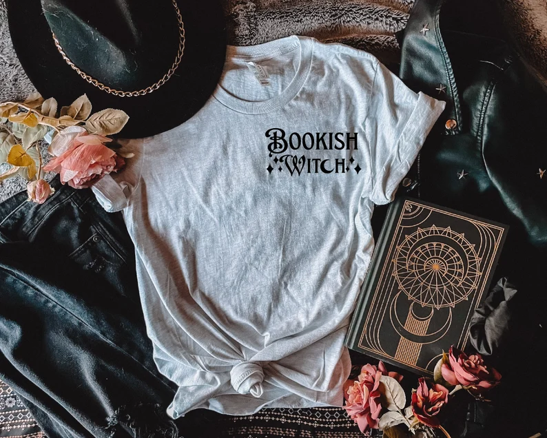 Image of a gray tshirt that says "bookish witch."