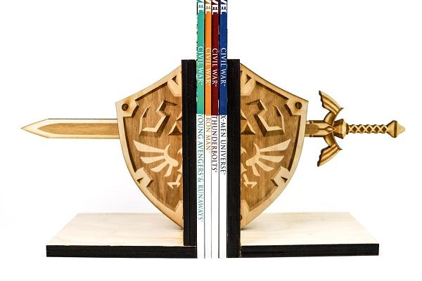 Image of handmade wood bookends crafted as Hylian shield and Master Sword from Legend of Zelda