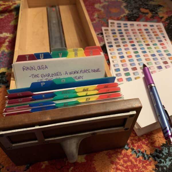 open card catalog drawer with many cards and alphabet tabs; photo by Liberty Hardy