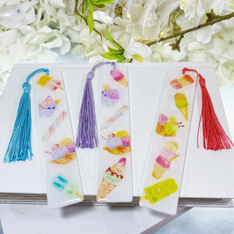 Set of three resin bookmarks, each featuring colorful ice cream treats. 