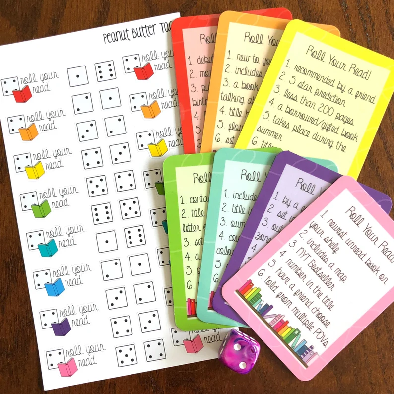 Image of a set of colorful cards with a guide to how to use them. This is a dice game, and the roll determines which card you use and what prompt on the card to follow. 