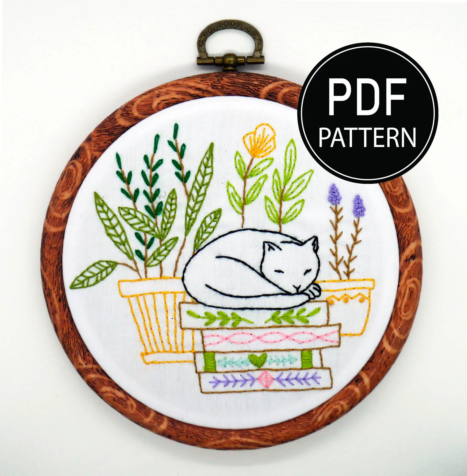 Image of colorful cat embroidery.