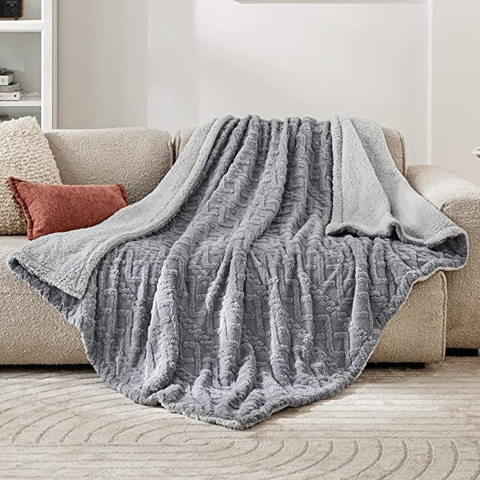 a photo of a soft blanket over a couch