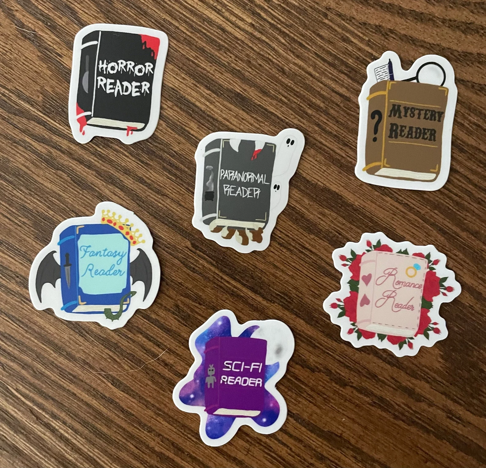 Image of several genre themed stickers.