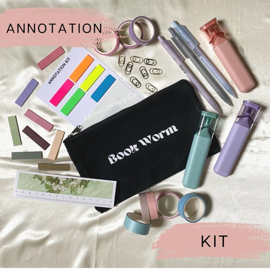 Image of an annotation kit with several pens, highlighters, a small tote bag, and washi tape. 