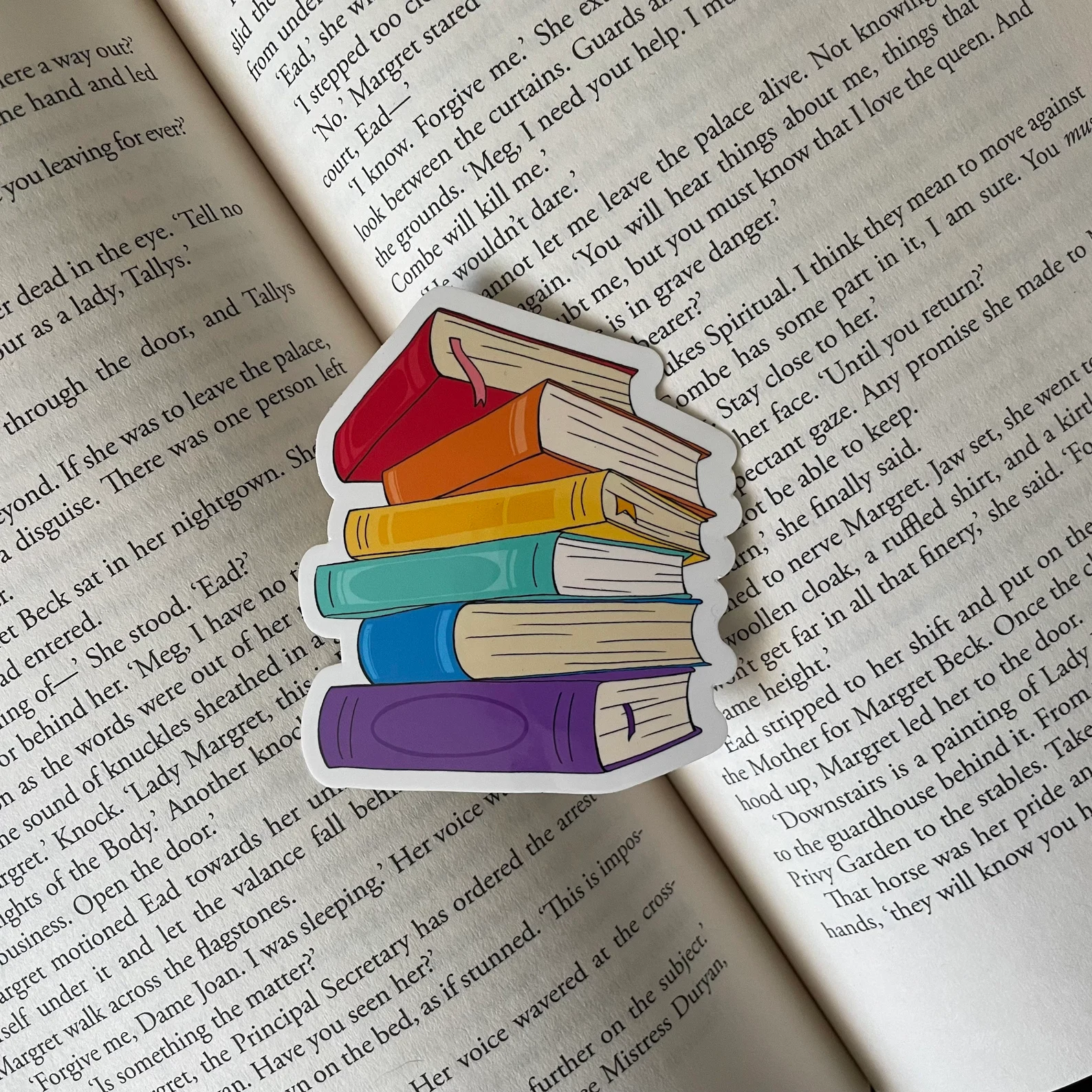 Image of a rainbow book stack