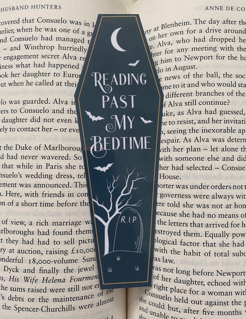 image of a coffin shaped bookmark that says "reading past my bedtime." 
