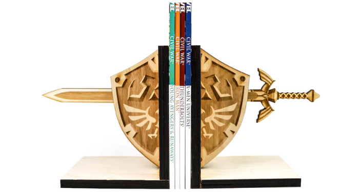 Image of handmade wood bookends crafted as Hylian shield and Master Sword from Legend of Zelda