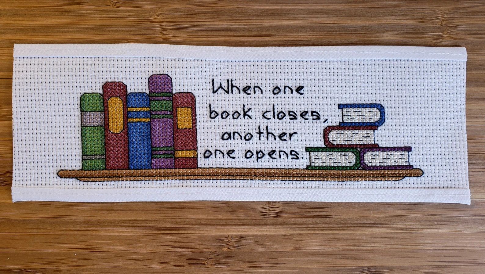 a photo of a Book Cross Stitch Bookmark Kit that says, 