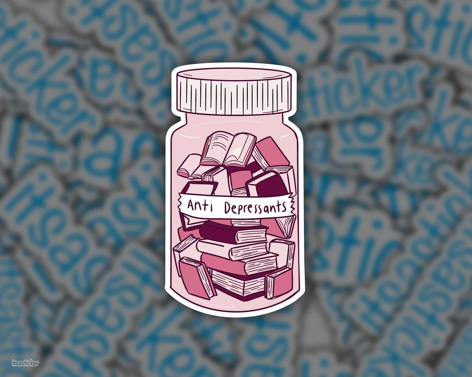A pink vinyl sticker in the shape of a pill bottle labeled "antidepressants" full of books.
