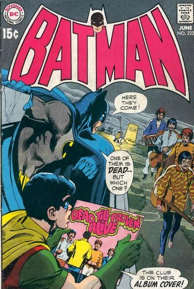 The cover to Batman #222. Batman and Robin stand in a graveyard, watching what is clearly meant to be the Beatles walk past them. Robin is holding an album called "Dead Till Proven Alive"; one band member is facing away from the viewer on the cover.
Batman: Here they come! One of them is dead - but which one?
Robin: The clue is on their album cover!