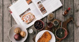 cookbook on table with ingredients