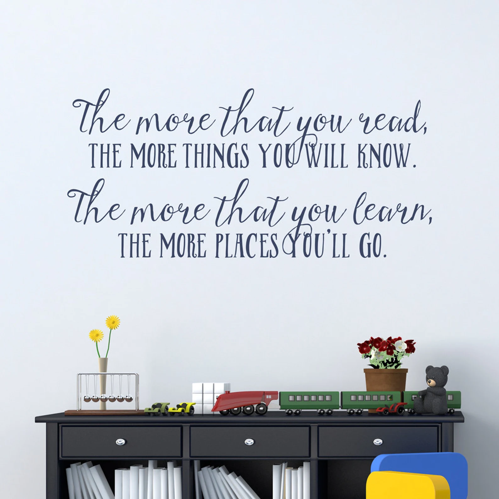 a wall decal that says "The more that you read, the more things you will know. The more that you learn, the more places you'll go." – Dr. Seuss