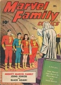 The cover of Marvel Family #1, showing Shazam, an elderly wizard, pointing at Captain Marvel, Captain Marvel, Jr., Mary Marvel, and Uncle Marvel, who are lined up like soldiers. A caption box at the bottom reads "Mighty Marvel Family Joins Forces vs. Black Adam!" A large book leaning against Shazam's throne reads "In full color: Capt. Marvel, Capt. Marvel Jr., Mary Marvel, and Uncle Marvel."