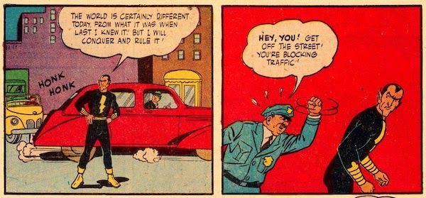 Two panels from Marvel Family #1.
Panel 1: Adam stands in the middle of a city street while cars honk at him.
Adam: The world it certainly different today from what it was when last I knew it! But I will conquer and rule it!
Panel 2: A cop shakes his fist at Adam.
Cop: Hey, you! Get off the street! You're blocking traffic!