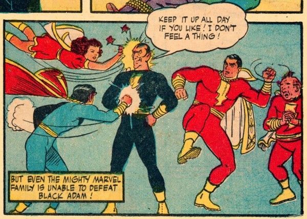 One panel from Marvel Family #1. Black Adam stands triumphantly in the center, hands on his hips. Mary Marvel is flying at him and punching him in the head. Captain Marvel, Jr. is punching him in the stomach. Captain Marvel is standing behind him, winding up like a baseball pitcher for a punch, and Uncle Marvel stands behind Captain Marvel, looking worried.
Adam: Keep it up all day if you like! I don't feel a thing!
Narration Box: But even the mighty Marvel family is unable to defeat Black Adam!