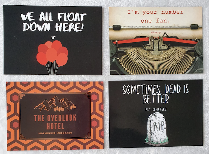 four Stephen King-inspired postcards