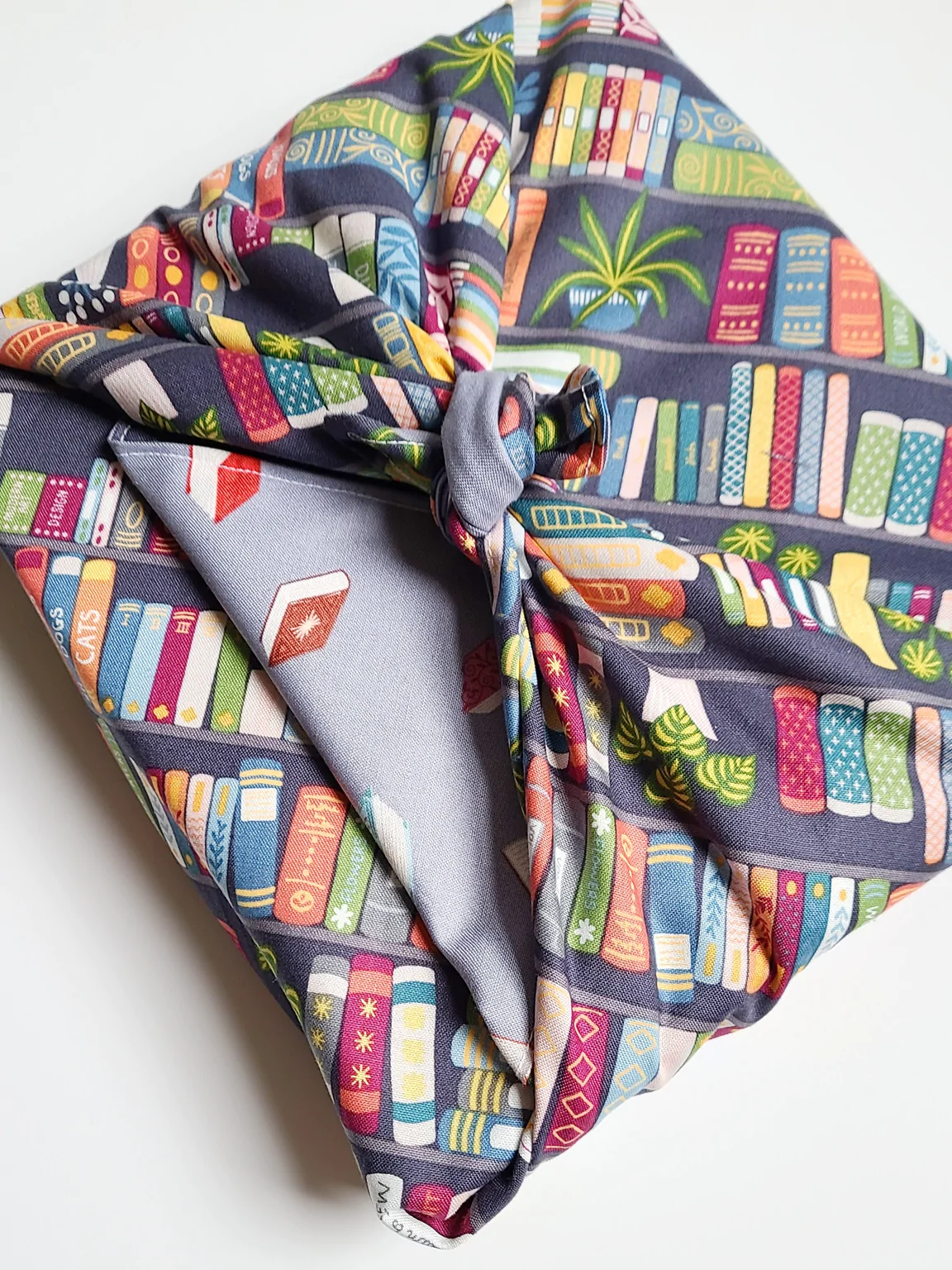 bookish cloth used as wrapping paper