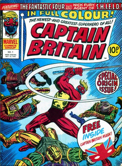 The cover of Captain Britain #1, showing a man in a red costume with a rampant gold lion on his chest swinging a red, white, and blue staff at his opponents. Burst on the cover read "In Full Colour!" "The newest - and greatest - superhero of all!" "Special Origin Issue!" "Free Inside Captain Britain Mask!"