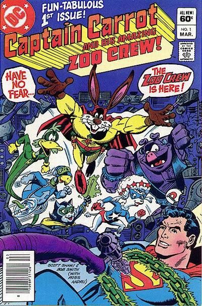 The cover of Captain Carrot and His Amazing Zoo Crew! #1. Captain Carrot, a muscular cartoon rabbit in a yellow, red, and green costume, smashes through the wall of a science lab while shouting "Have no fear...the Zoo Crew is here!" He is accompanied by five other animal superheroes: a duck, a turtle, a cat, a poodle, and a pig. They are rescuing Superman, who is bound with kryptonite chains and looks confused.