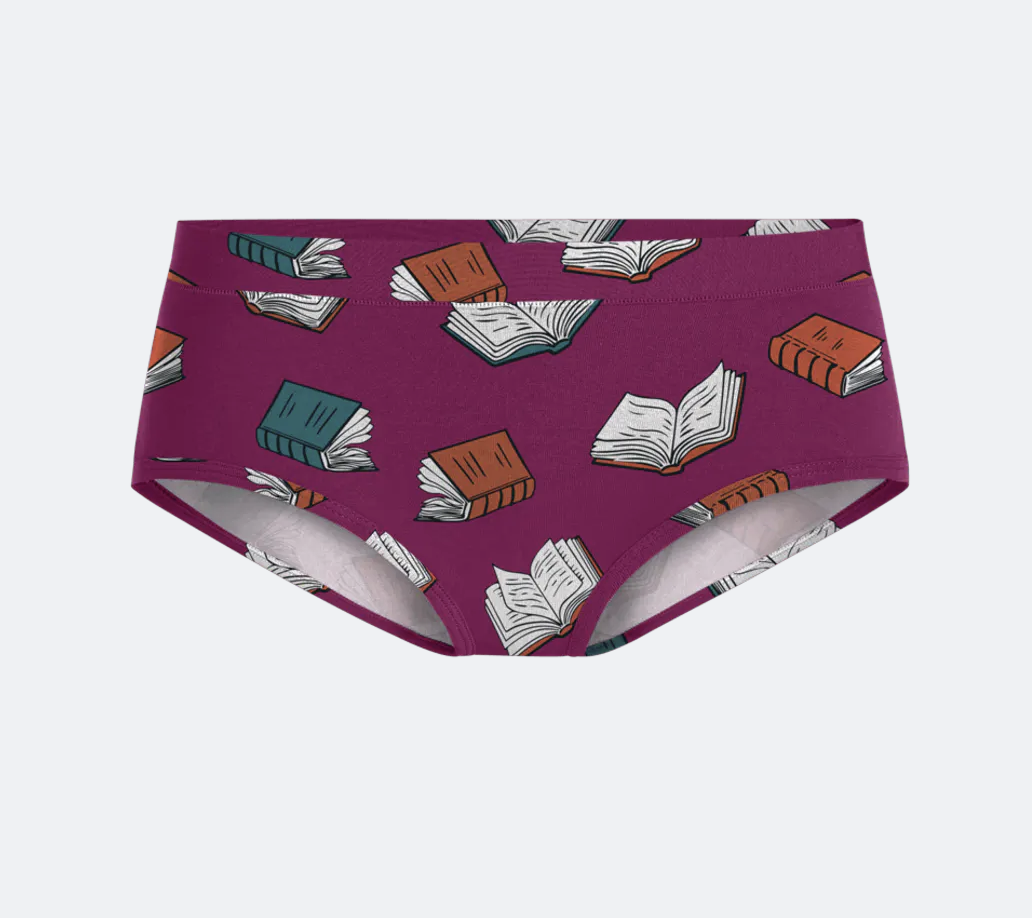 A maroon pair of underwear with an open book print