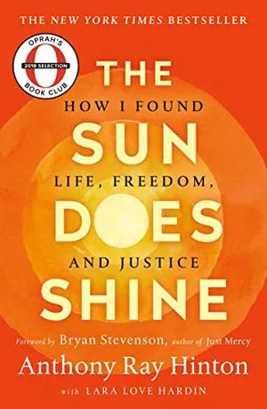 Book covecover of The Sun Does Shine by Anthony Ray Hinton; orange with yellow rings radiating from the centerr of The Sun Does Shine