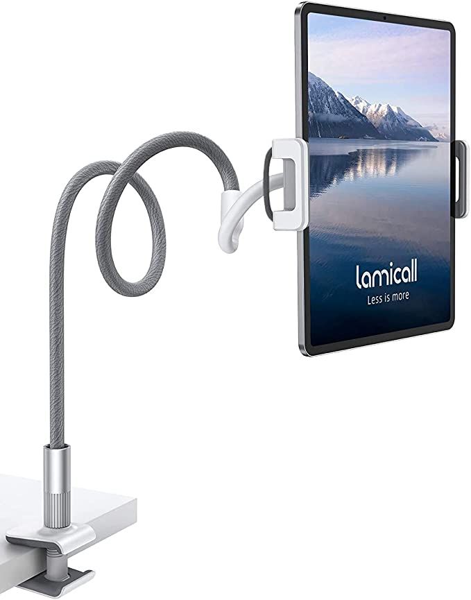 A grey gooseneck tablet holder with a clamp to hold it to the edge of a table. 