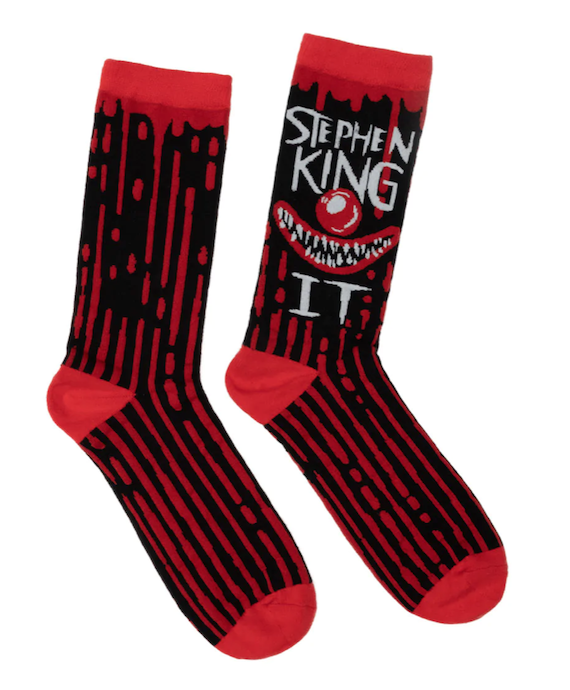 Socks featuring the title and author of Stephen King's It and the creepy mouth and nose of Pennywise the clown. 