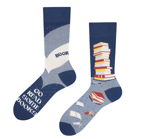 Blue socks featuring a stack of books on one sock and the words 