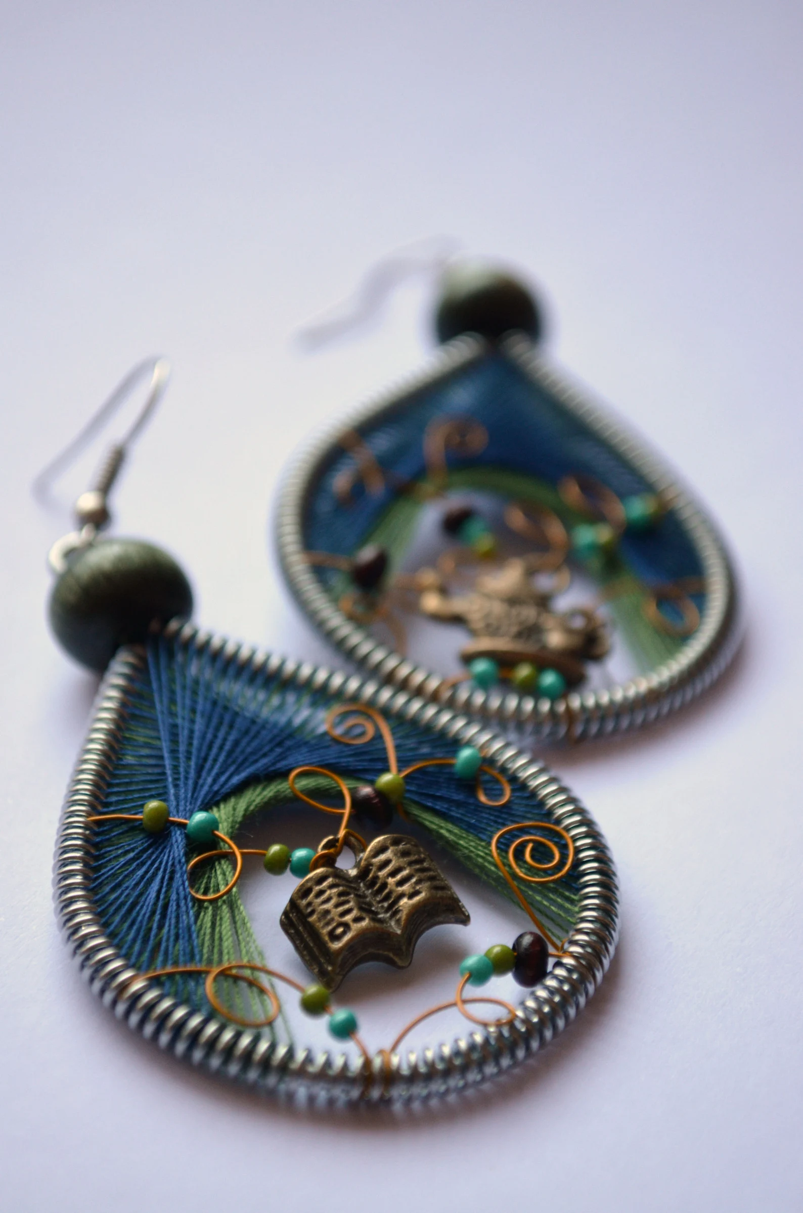 Chandelier earrings with embroidery three and book charms