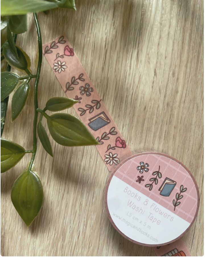 Image of pink washi tape with books and flowers.