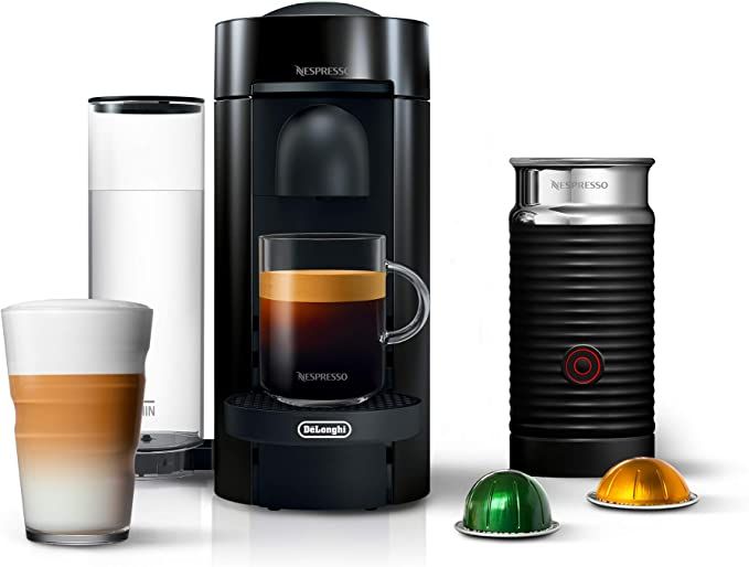 black Nespresso Vertuo Coffee and Espresso machine with milk brother, two espresso  pods, and a canister for water, and black tumbler 