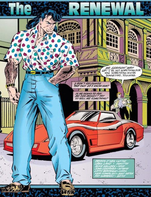 One page from Nightwing #2 (1995 series). Dick is standing in the foreground. His shirt is an oversized short sleeved white button down covered in red, blue, and green polka dots. His jeans are light blue and very tightly belted very high up on his waist. He is wearing loafers and his hair is in mullet cut that falls to his shoulders.