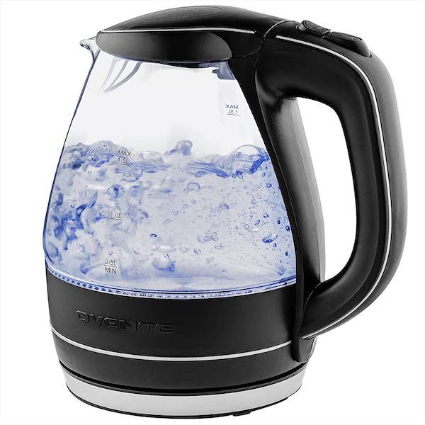 black and glass kettle filled halfway with water